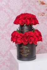 Eiffel Tower shaped arrangement with red roses