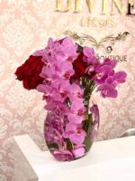 Le Charme arrangement with deep red roses