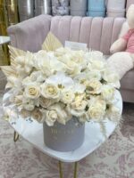 Celine round box with white and cream roses