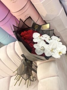 Hand Bouquet of Roses and Large Orchid - Image 2