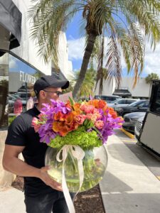 Fresh Cut Flowers In Clear Large Glass Bowl Vase - Image 3