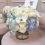 Arreglo de Flores Mixtas en Jarrón Bebé Niño