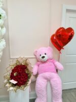 Grand Rose Bear bouquet of red roses paired with an oversized teddy bear