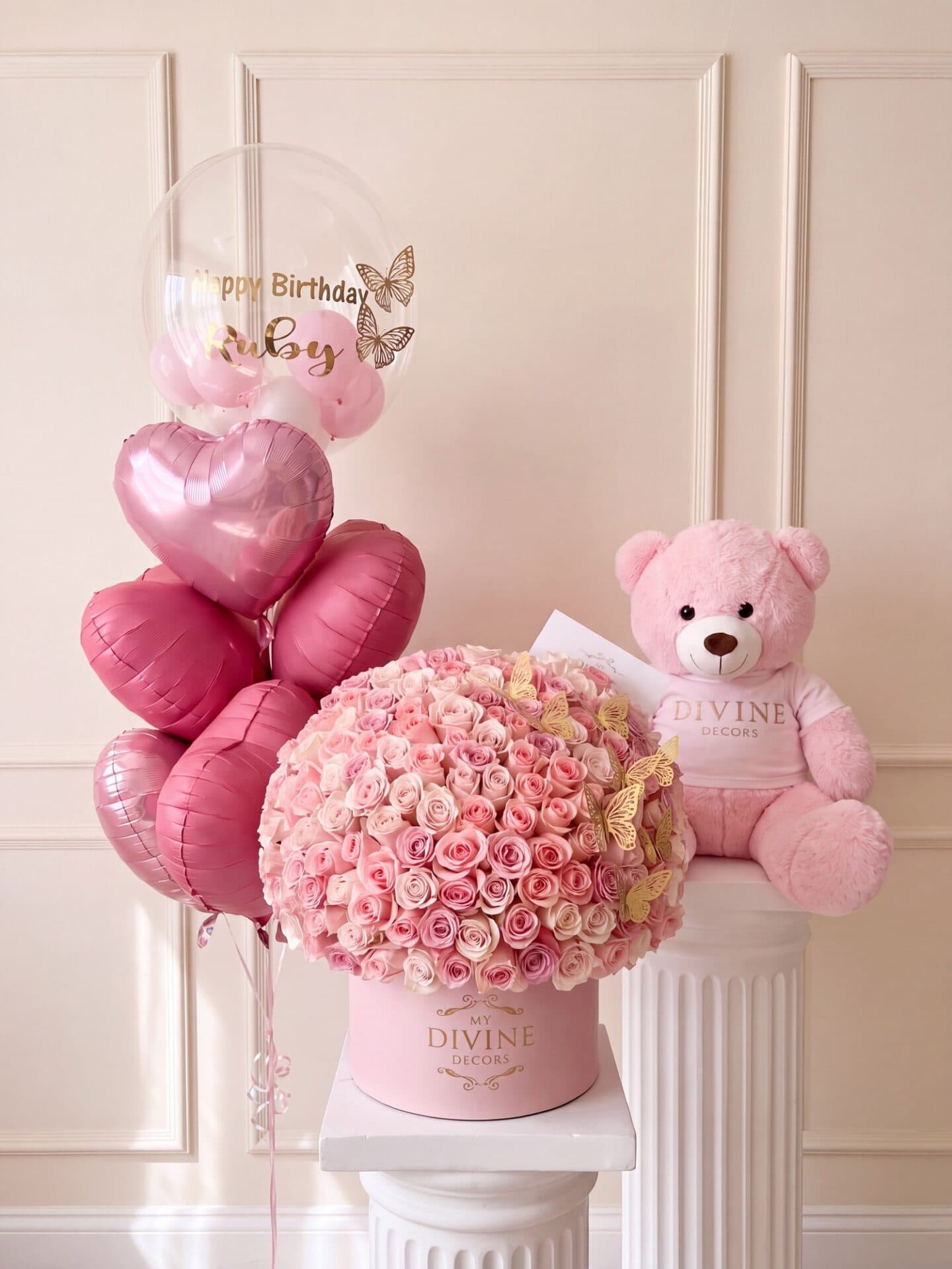 The Ultimate bundle: 150 light pink roses with gold butterflies in a pink My Divine Decors box, pink teddy bear and heart balloons The Ultimate bundle: 150 light pink roses with gold butterflies in a pink My Divine Decors box, pink teddy bear and heart balloons