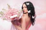 Woman holding a bright pink bouquet