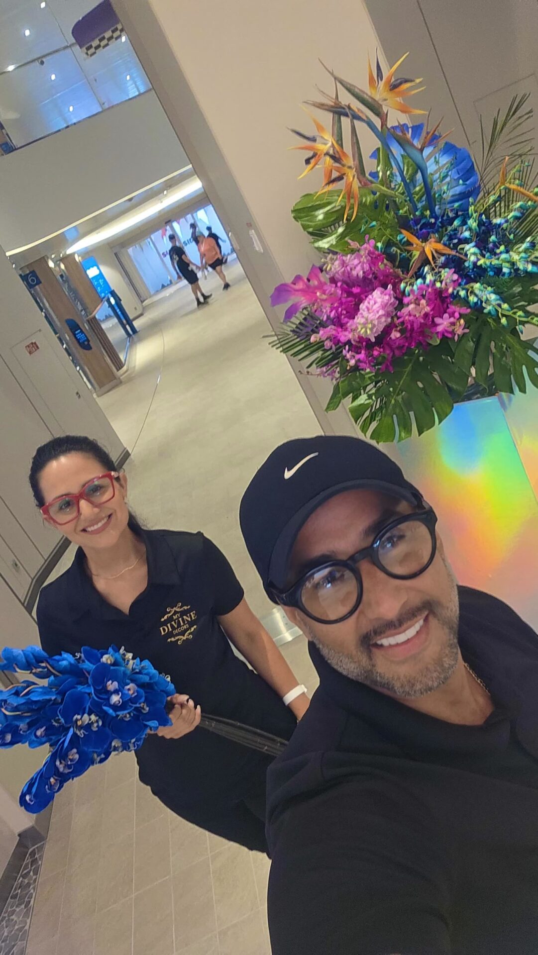 Jessica and Nelson delivering a floral installation aboard a cruise ship