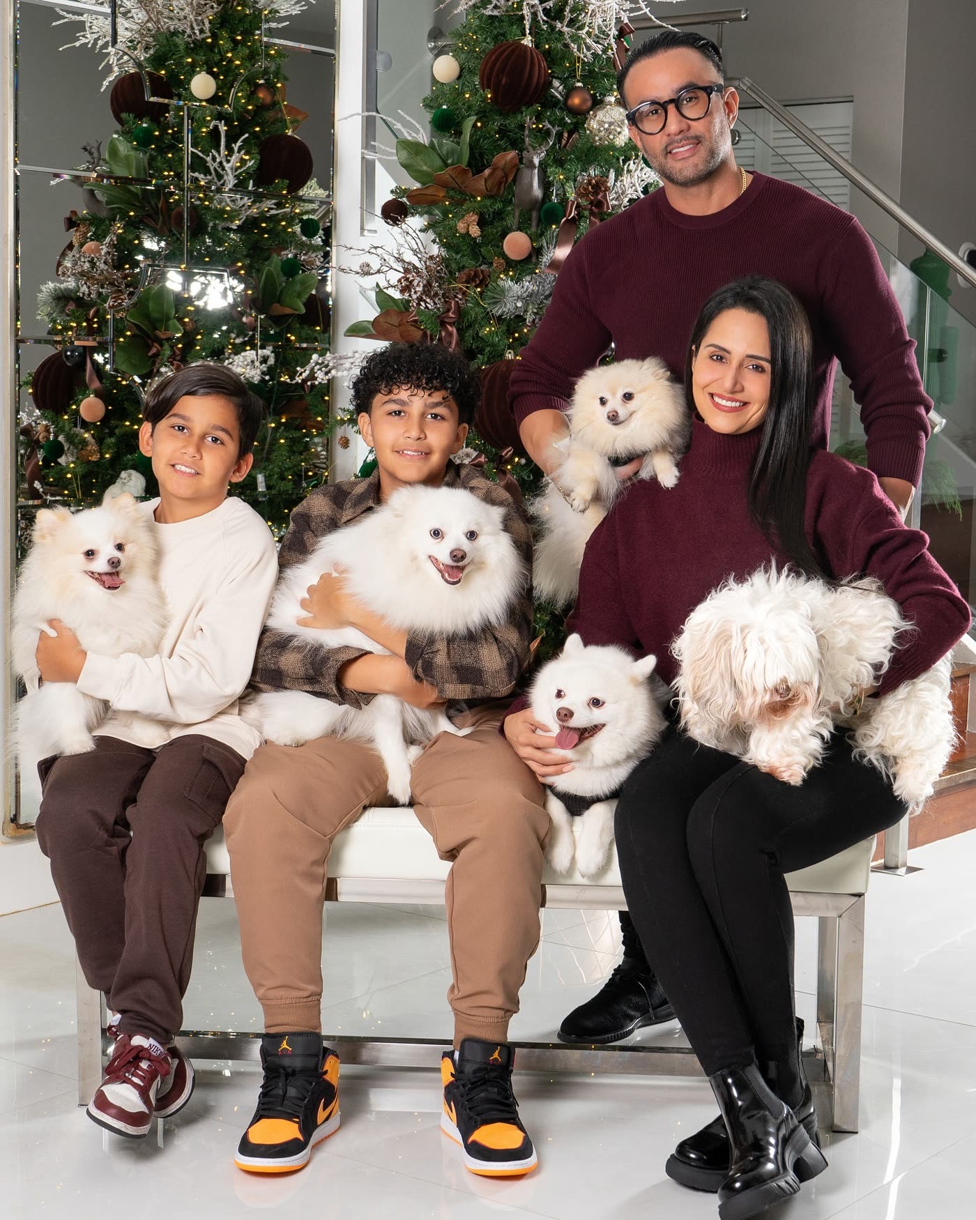 The Ramirez-Nunez family with their dogs at Christmas