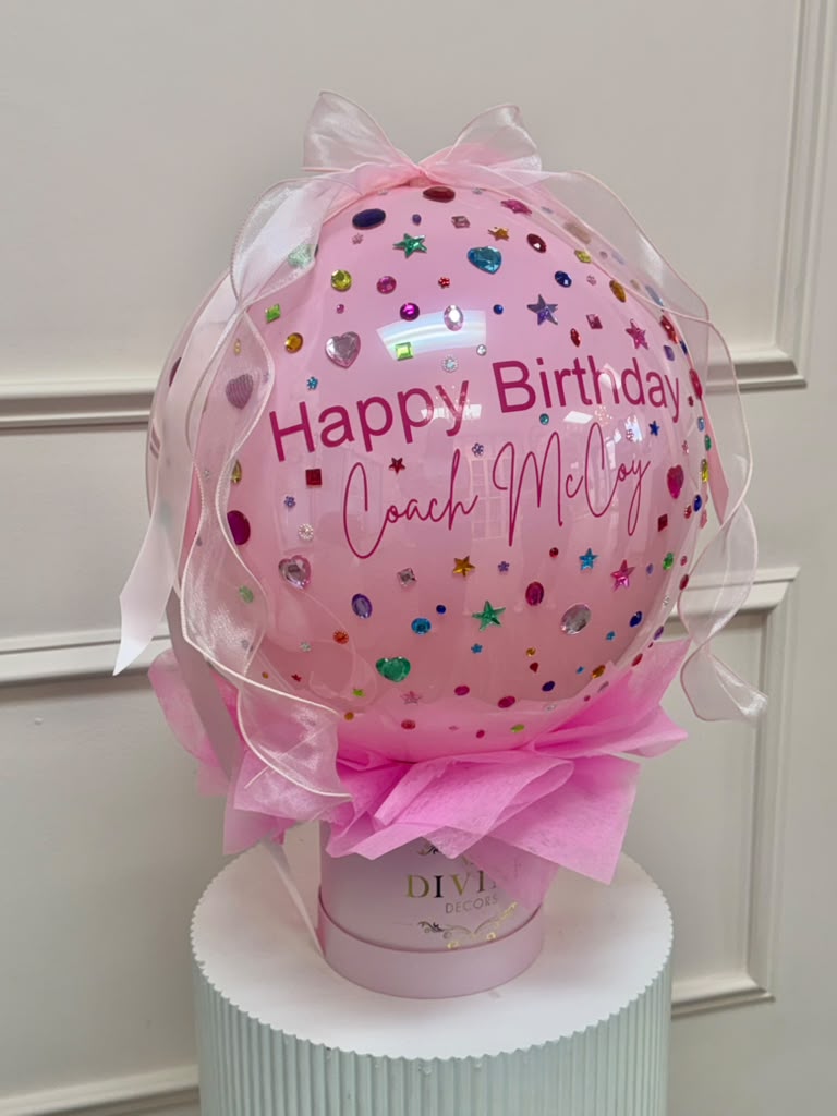 Personalized Bubble Balloon Gift Box detail Close view of the rhinestones and organza ribbon on a personalized bubble balloon