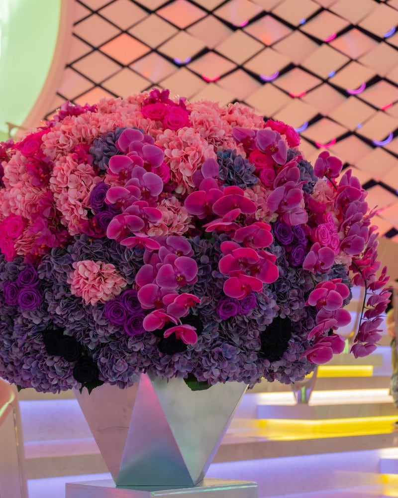 Pink and burgundy rose sphere on a silver pedestal on Star of the Seas