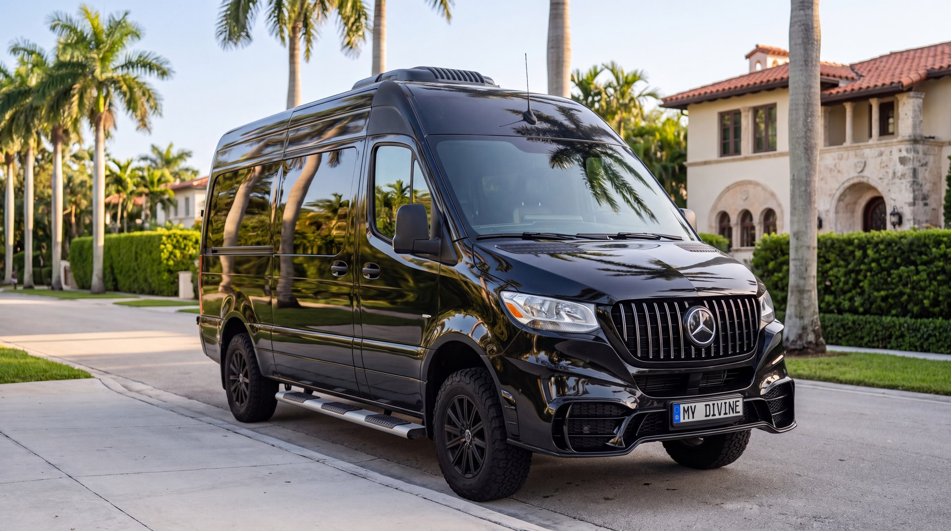 My Divine Decors black Mercedes delivery van parked on a palm-lined street in Coral Gables
