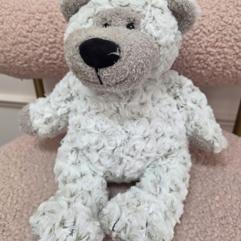 Osito de peluche Greyson de Melissa & Doug con pelaje marfil y gris en remolinos