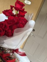 Reflexed Red Rose Elegance Bouquet, open red roses in white wrap