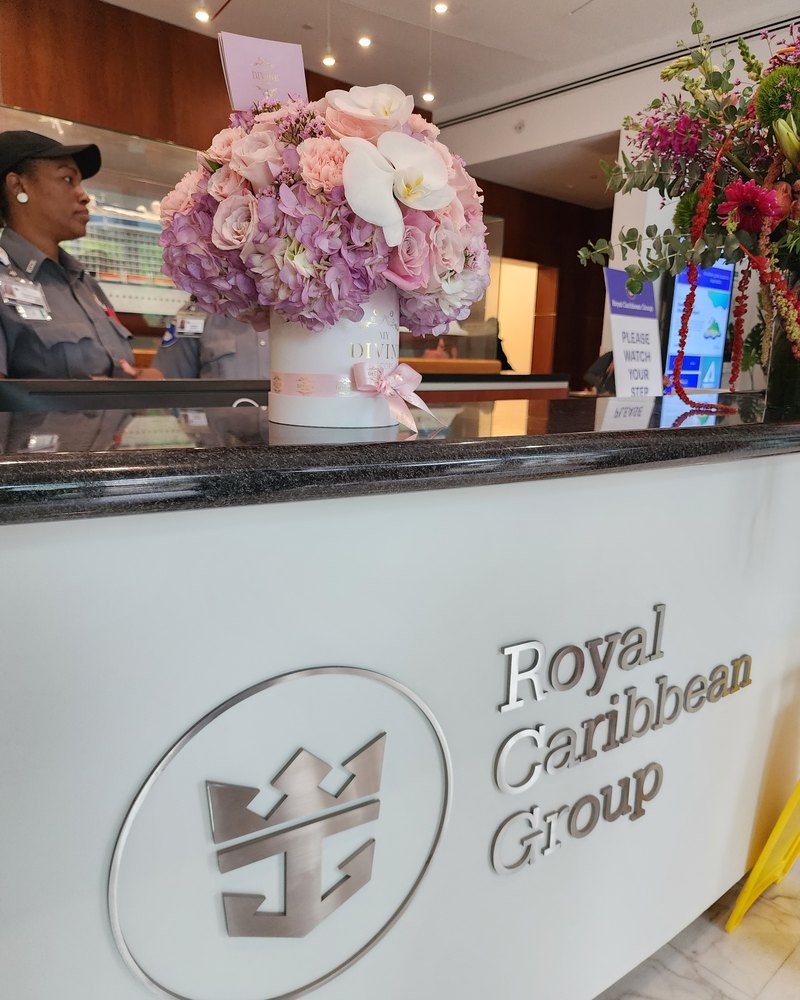 Pastel rose box from My Divine Decors on the Royal Caribbean Group reception desk