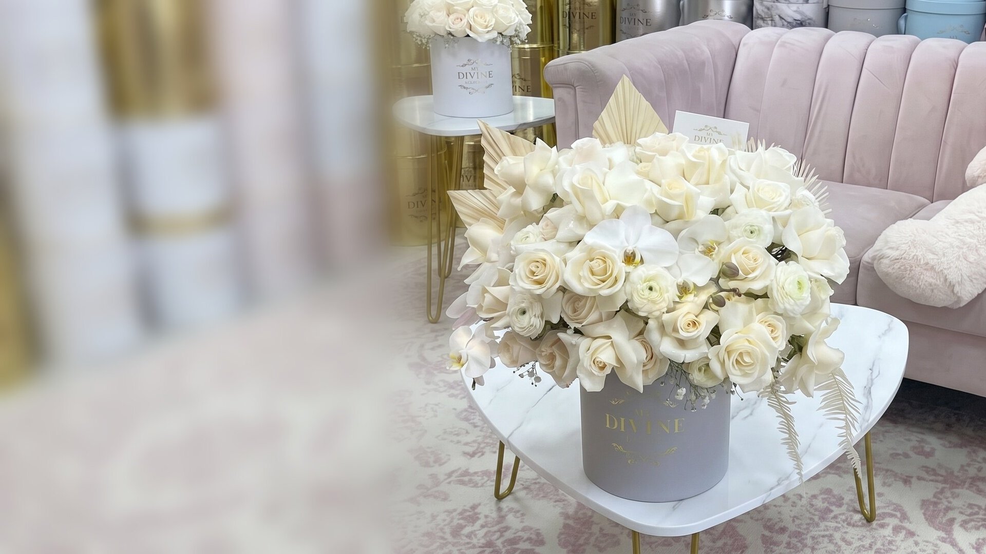 Celine Hat Box by My Divine Decors: white roses, ranunculus and orchids in a gray hat box