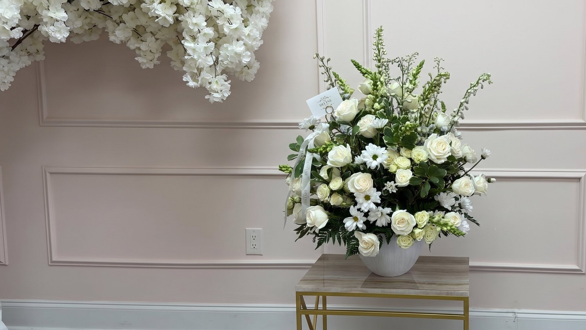 White Pure Elegance Vase Arrangement by My Divine Decors: white roses, snapdragons and daisies in a white vase